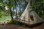 Inside the teepee is a comfortable Queen bed and dresser. 
